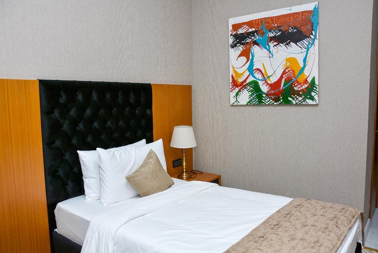 Готель Ramada By Wyndham Turkistan Екстер'єр фото