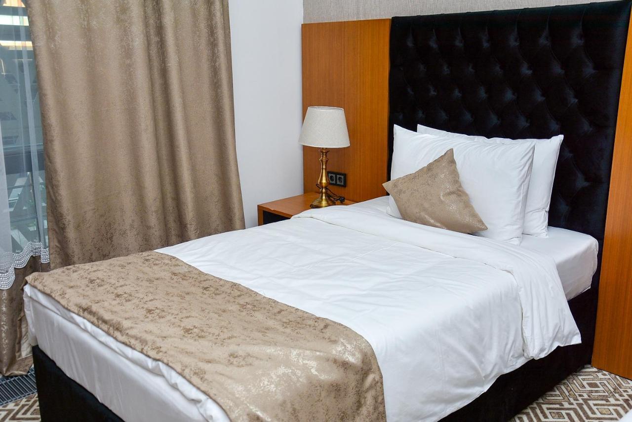Готель Ramada By Wyndham Turkistan Екстер'єр фото